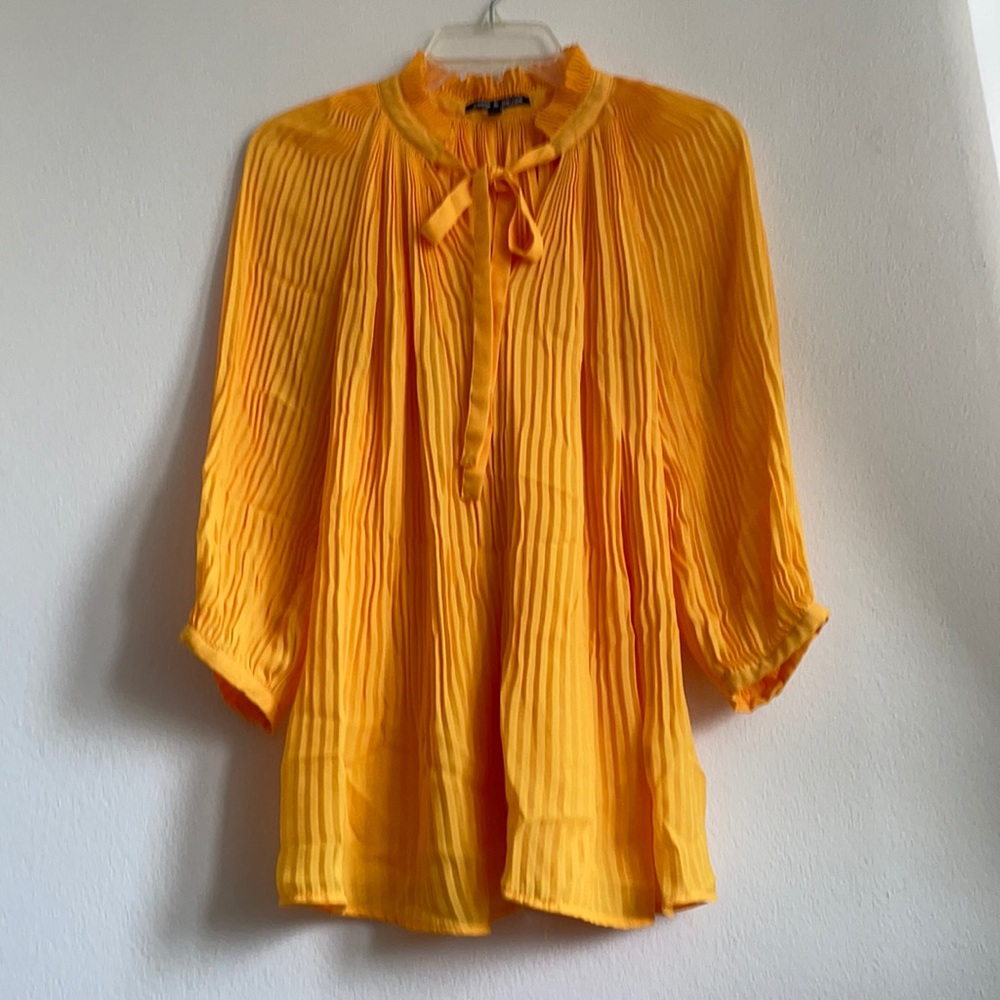 Cable and gauge Pleated top